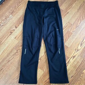 Nike Women's Black Athletic Pants with Reflective Details